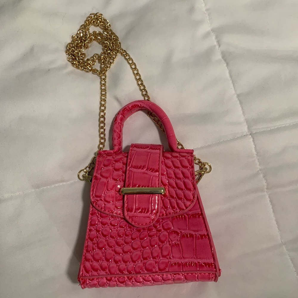 Mini pink crocodile purse